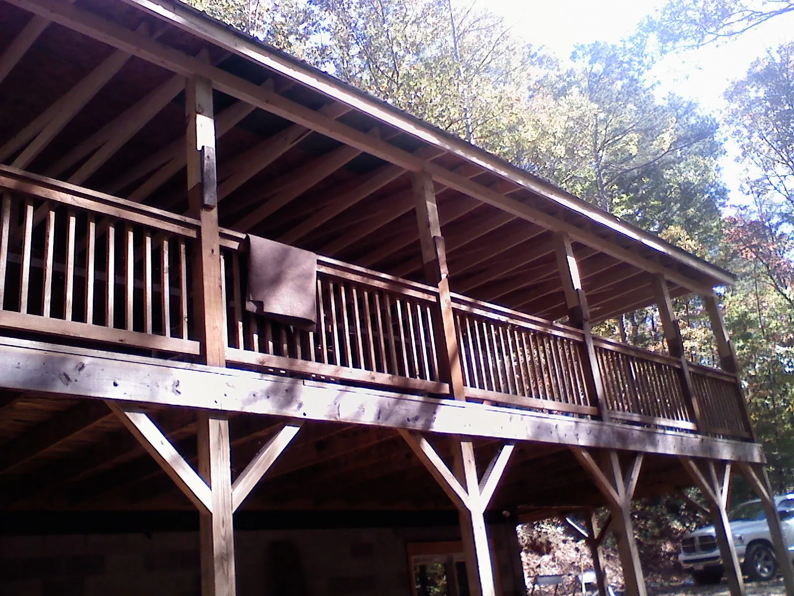 Timber framing under a new elevated porch and deck — Roof Leak Repair in Bruington by Roofing Brothers